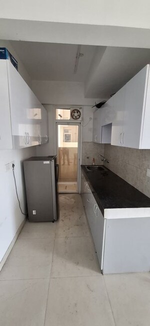 Kitchen in 2 BHK Apartment at Signature Global The Millennia, Sector 37d – for Rent