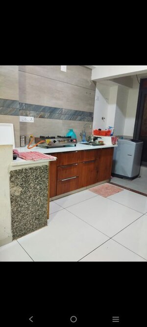 Kitchen in 2 BHK Apartment at Adani Augusta, Tragad – for Rent