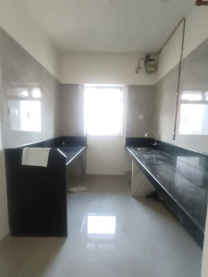 Kitchen in 1 BHK Apartment at Group Satellite Elegance, Goregaon East – for Rent
