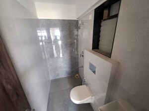 Bathroom in 3 BHK Apartment at Roswalt Ray, Dahisar East – for Rent