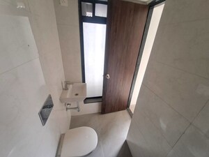 Bathroom in 3 BHK Apartment at Roswalt Ray, Dahisar East – for Rent
