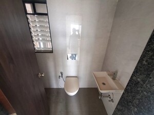 Bathroom in 3 BHK Apartment at Roswalt Ray, Dahisar East – for Rent
