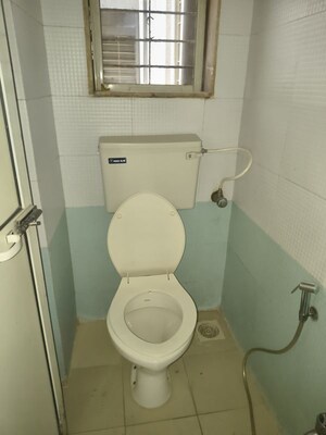 Bathroom in 1 BHK Apartment at Shanti Gardens , Mira Road – for Rent