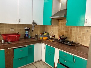 Kitchen in 3 BHK Apartment at Mahagun Moderne, Sector 78 – for Rent