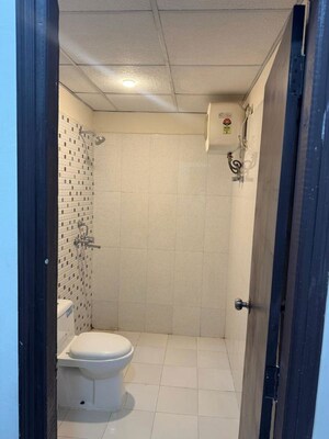 Bathroom in 2 BHK Apartment at Ansal API Celebrity Gardens, Sushant Golf City – for Rent
