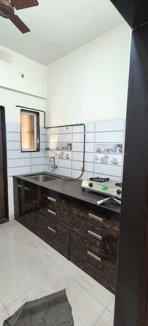 Kitchen in 1 BHK Apartment at Rajaram Sukur Sapphire, Ghodbunder Road – for Rent