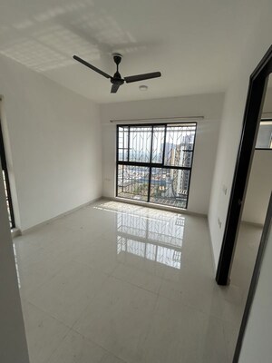 Living Room in 1 BHK Apartment at Lodha Palava Crown, Dombivli East – for Rent