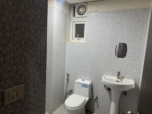 Bathroom in 2 BHK Apartment at Ansal API Celebrity Gardens, Sushant Golf City – for Rent