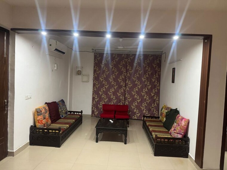 Living Room, ansal-api-celebrity-gardens 2 Bedroom 1320 Sq.Ft. Apartment In Sushant Golf City Lucknow 10778501