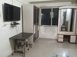 Living Room in 1 BHK Apartment at The Pearl Apartments, Kharadi – for Rent