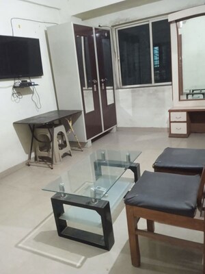 Living Room in 1 BHK Apartment at The Pearl Apartments, Kharadi – for Rent