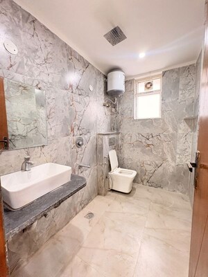 Bathroom in 3 BHK Builder Floor at Palm Residency Chhatarpur, Chattarpur – for Rent