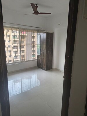 Room in 2 BHK Apartment at Ganga New town, Dhanori – for Rent