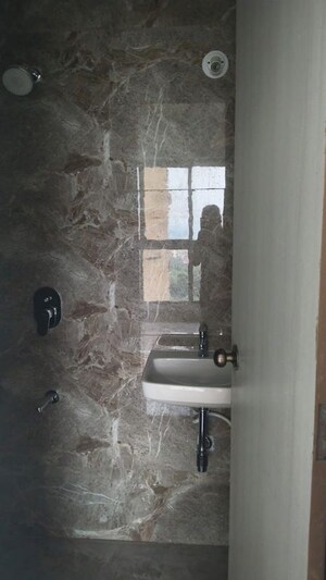 Bathroom in 1 BHK Apartment at Shraddha Vardaan, Bhandup West – for Rent