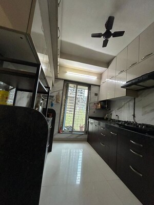 Kitchen in 2 BHK Apartment at Adinath Sanvi Heights, Goregaon West – for Sale