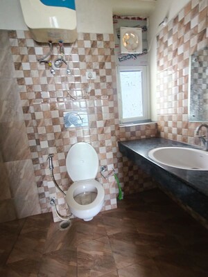 Bathroom in 2 BHK Apartment at Ansal API Celebrity Gardens, Sushant Golf City – for Rent