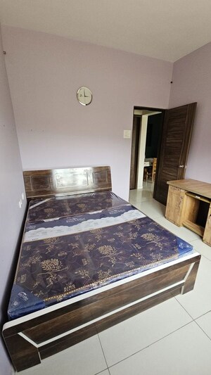 Bedroom in 2 BHK Apartment at Megapolis Symphony, Hinjewadi – for Rent