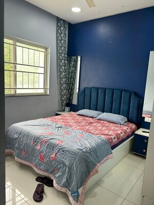 Bedroom in 2 BHK Apartment at Megapolis Symphony, Hinjewadi – for Rent