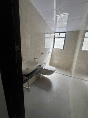 Bathroom in 4 BHK Apartment at LK Umang Heights, Andheri West – for Sale