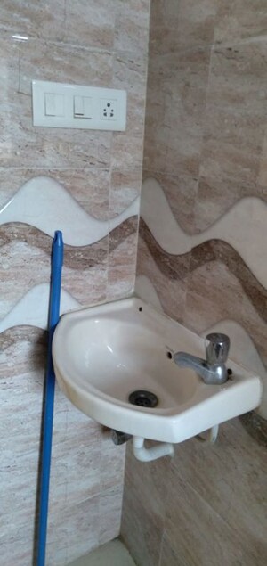 Bathroom in 1.5 BHK Apartment at Tilak Indrayani, Tilak Nagar – for Rent