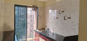 Kitchen in 1.5 BHK Apartment at Tilak Indrayani, Tilak Nagar – for Rent