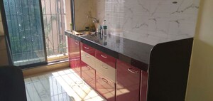 Kitchen in 1.5 BHK Apartment at Tilak Indrayani, Tilak Nagar – for Rent