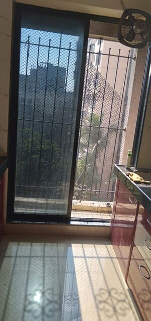 Staircase in 1.5 BHK Apartment at Tilak Indrayani, Tilak Nagar – for Rent