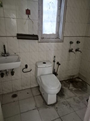Bathroom in 4 BHK Apartment at Mayur Vihar – for Sale