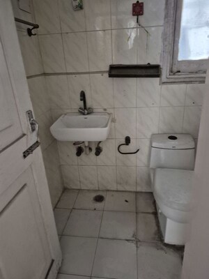 Bathroom in 4 BHK Apartment at Mayur Vihar – for Sale