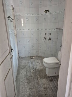 Bathroom in 4 BHK Apartment at Mayur Vihar – for Sale
