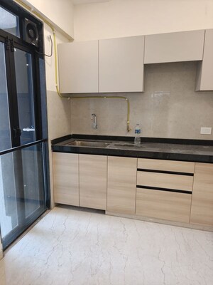 Kitchen in 2 BHK Apartment at Our Home CHS, Andheri West – for Rent