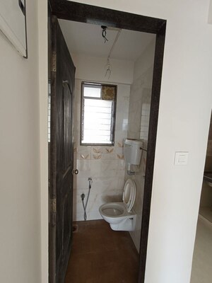 Bathroom in 1 BHK Apartment at Alpine Primo, Andheri West – for Sale