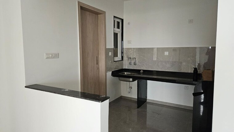Kitchen, zen-elite 3 Bedroom 915 Sq.Ft. Apartment In Kharadi Pune 10779503