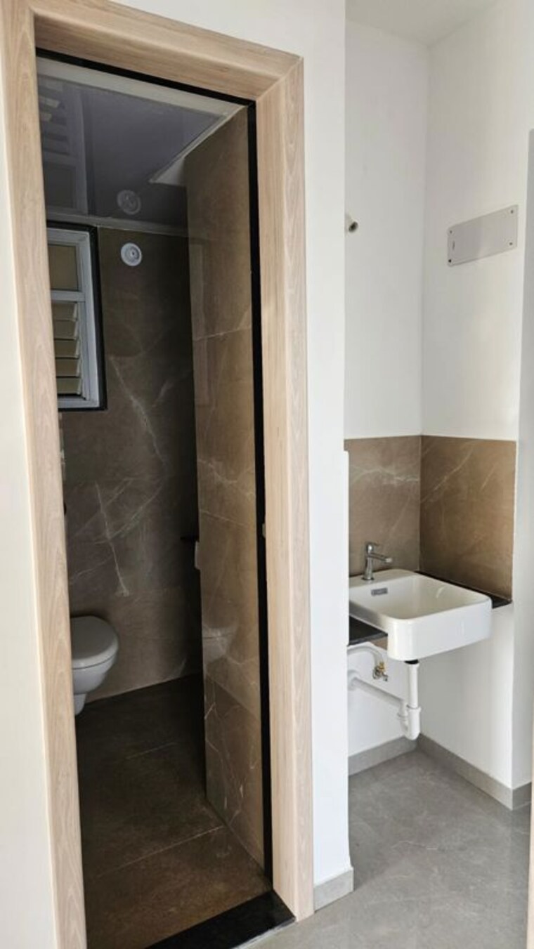 Bathroom, zen-elite 3 Bedroom 915 Sq.Ft. Apartment In Kharadi Pune 10779503