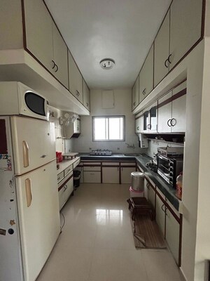 Kitchen in 2 BHK Apartment at Goldcrest Nilgiri Greens, Aundh – for Rent