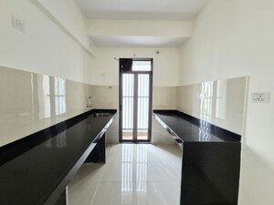 Kitchen in 1.5 BHK Apartment at Runwal My City, Manpada – for Rent