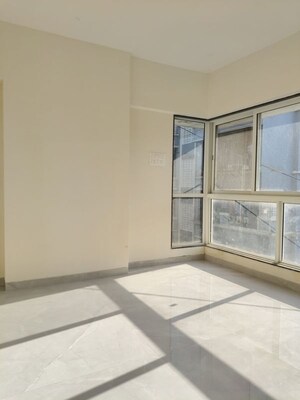 Room in 2.5 BHK Apartment at Mangal Karini, Goregaon West – for Sale