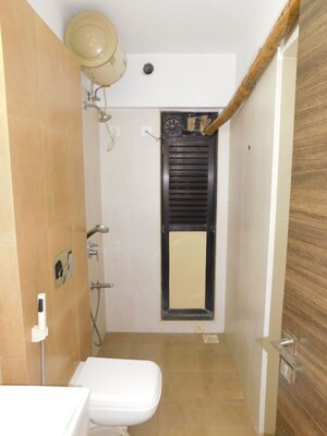 Bathroom in 2 BHK Apartment at Kanakia Rainforest, Andheri East – for Rent
