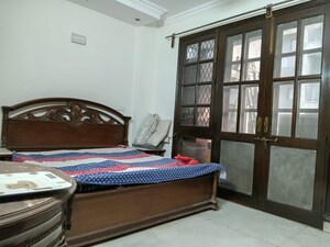 Bedroom in 2 BHK Builder Floor at East Of Kailash – for Rent