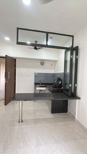 Kitchen in 1 BHK Apartment at Lodha Crown Quality Homes, Majiwada – for Rent