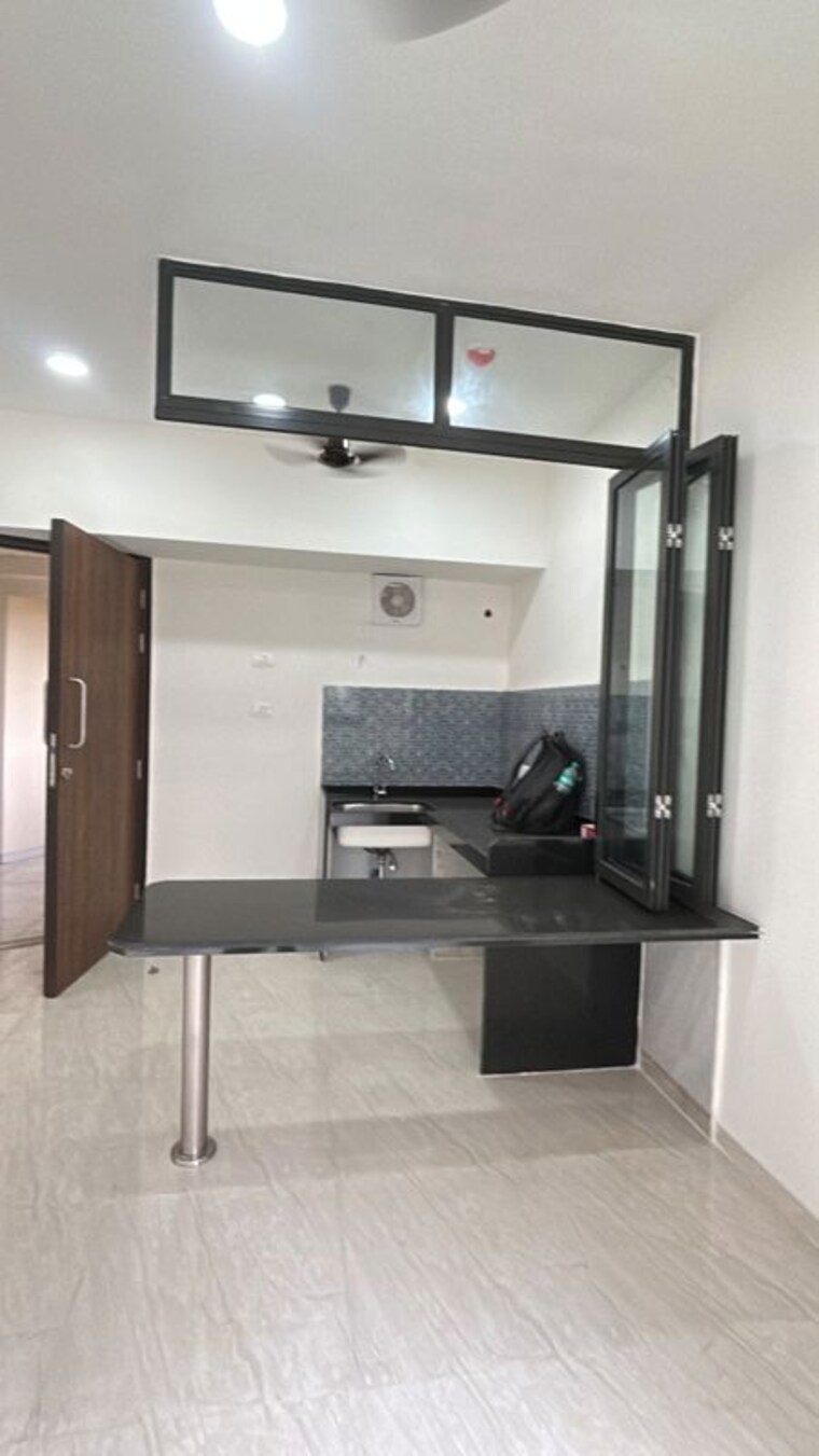Kitchen, lodha-crown-quality-homes 1 Bedroom 317 Sq.Ft. Apartment In Majiwada Thane 10779683