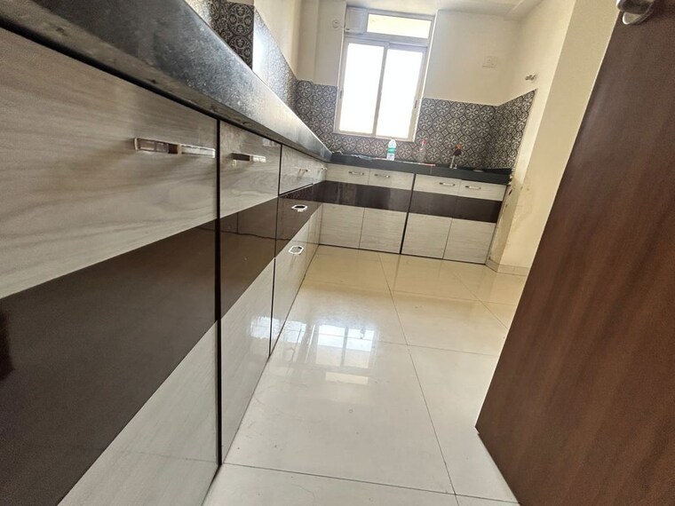 Kitchen, lodha-amara 2 Bedroom 781 Sq.Ft. Apartment In Kolshet Road Thane 10779700