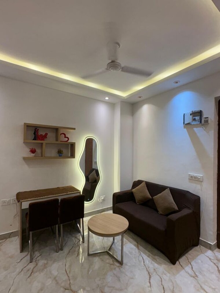 Living Room, nimbus-the-golden-palm 1 Bedroom 506 Sq.Ft. Apartment In Sector 168 Noida 10779709