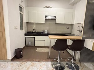 Team Area in 1 BHK Apartment at Nimbus The Golden Palm, Sector 168 – for Rent