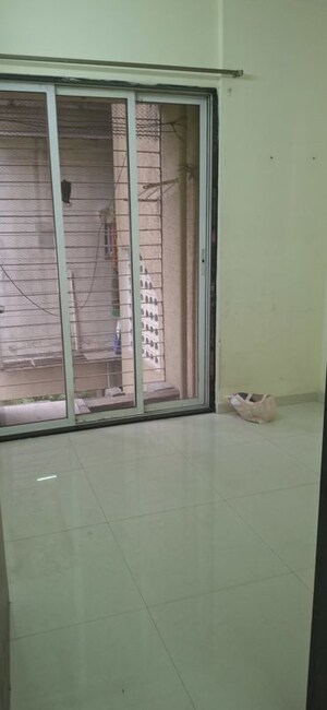 Room in 2 BHK Apartment at Sai Ashish CHS, Ghansoli – for Rent