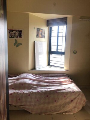 Bedroom in 2 BHK Apartment at Rohan Nilay, Aundh – for Rent