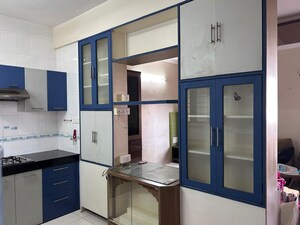 Kitchen in 2 BHK Apartment at Rohan Nilay, Aundh – for Rent