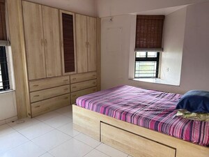 Bedroom in 2 BHK Apartment at Rohan Nilay, Aundh – for Rent