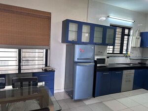Kitchen in 2 BHK Apartment at Rohan Nilay, Aundh – for Rent
