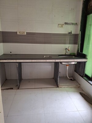 Kitchen in 1 BHK Apartment at Sai Ashish CHS, Ghansoli – for Rent